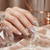 A close up image of Cotton Candy press on nails on hand