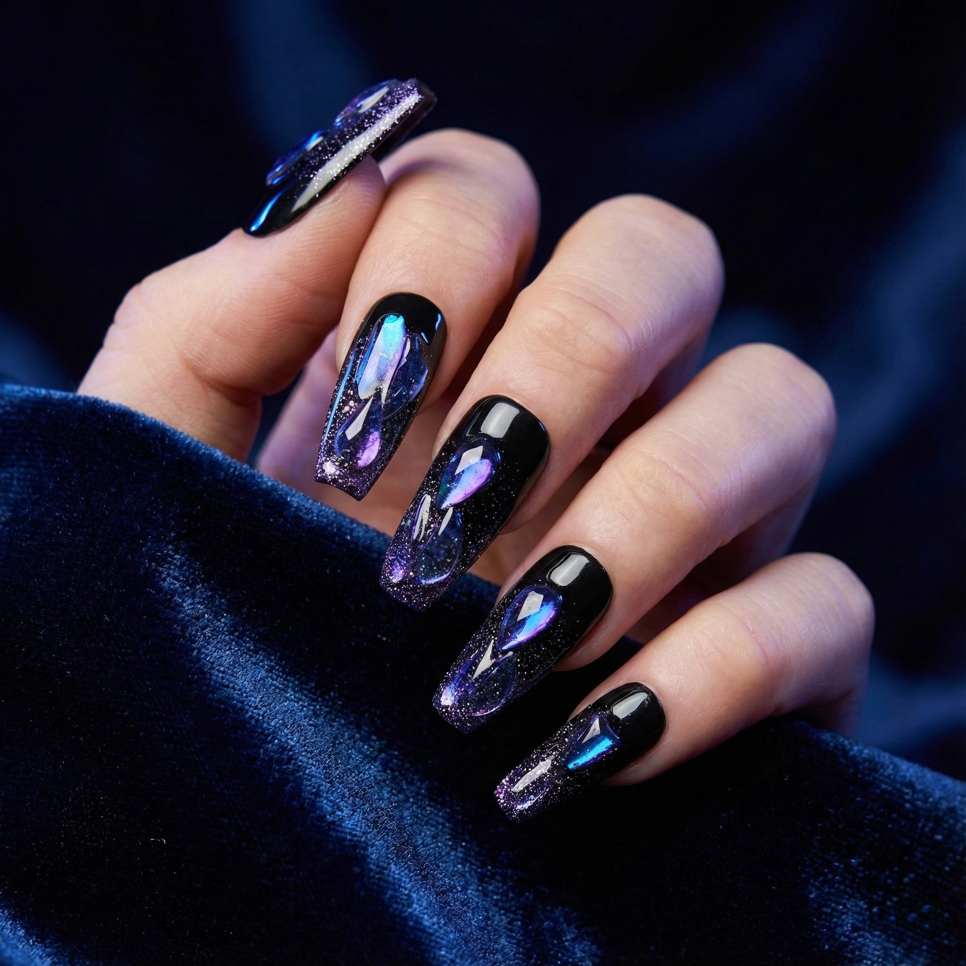A close up showcase of Venom Drip press on nails on hand